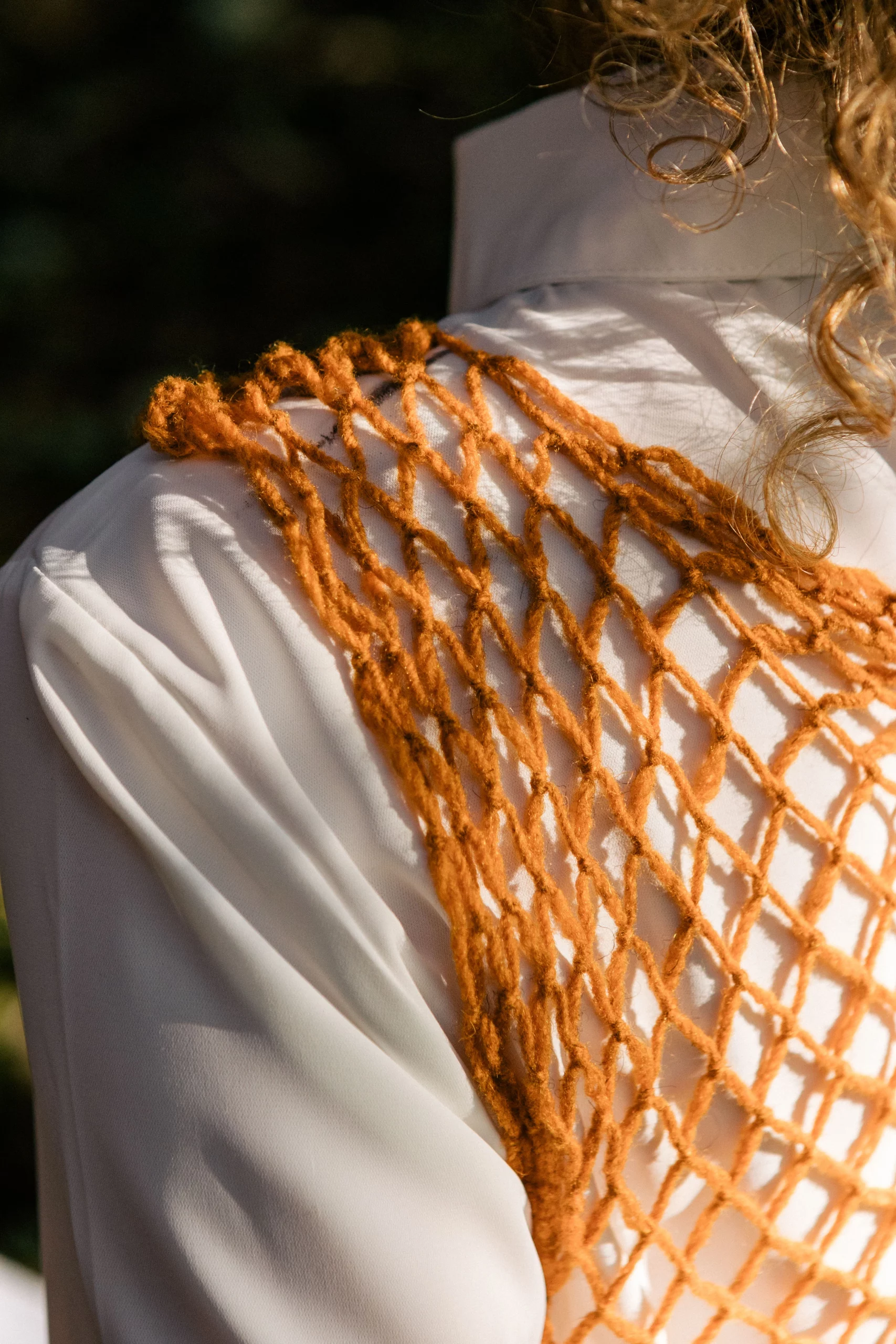 Top bedul naranja detalle lana